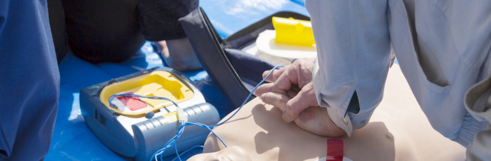 practicing cpr with a mannequin